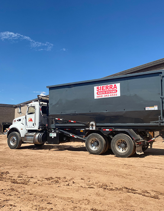 Sierra Waste Systems truck with a large dumpster | Sierra Waste